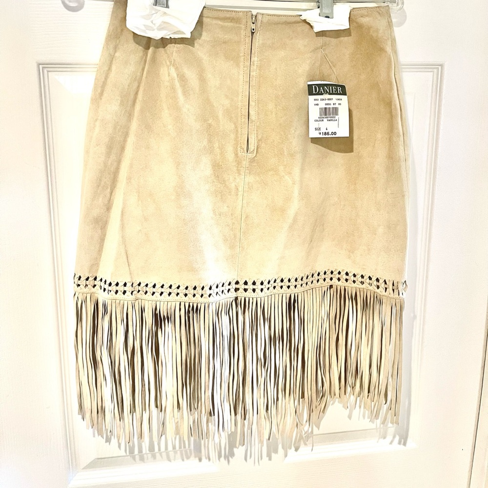 Classy and sexy Beige Fringe Skirt new with tag sz.4 soft suede light beige.